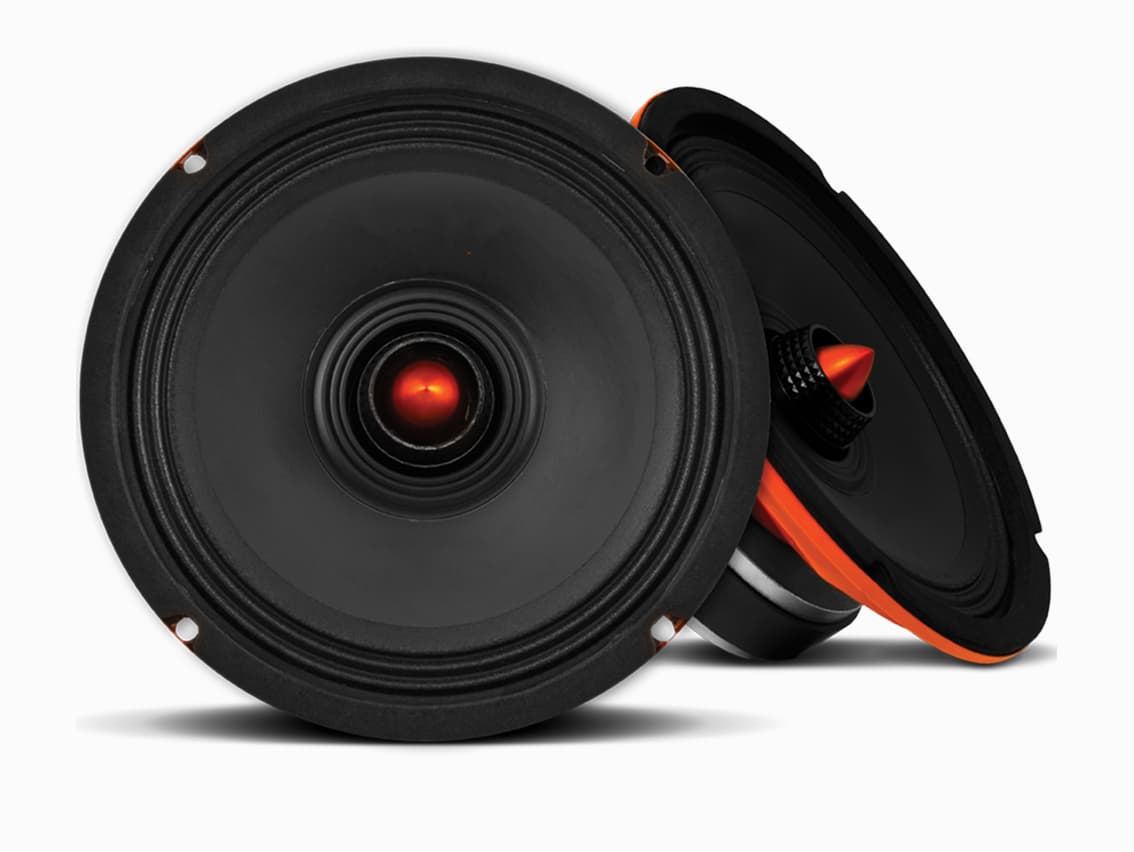 Car audio technician installing speaker system in vehicle